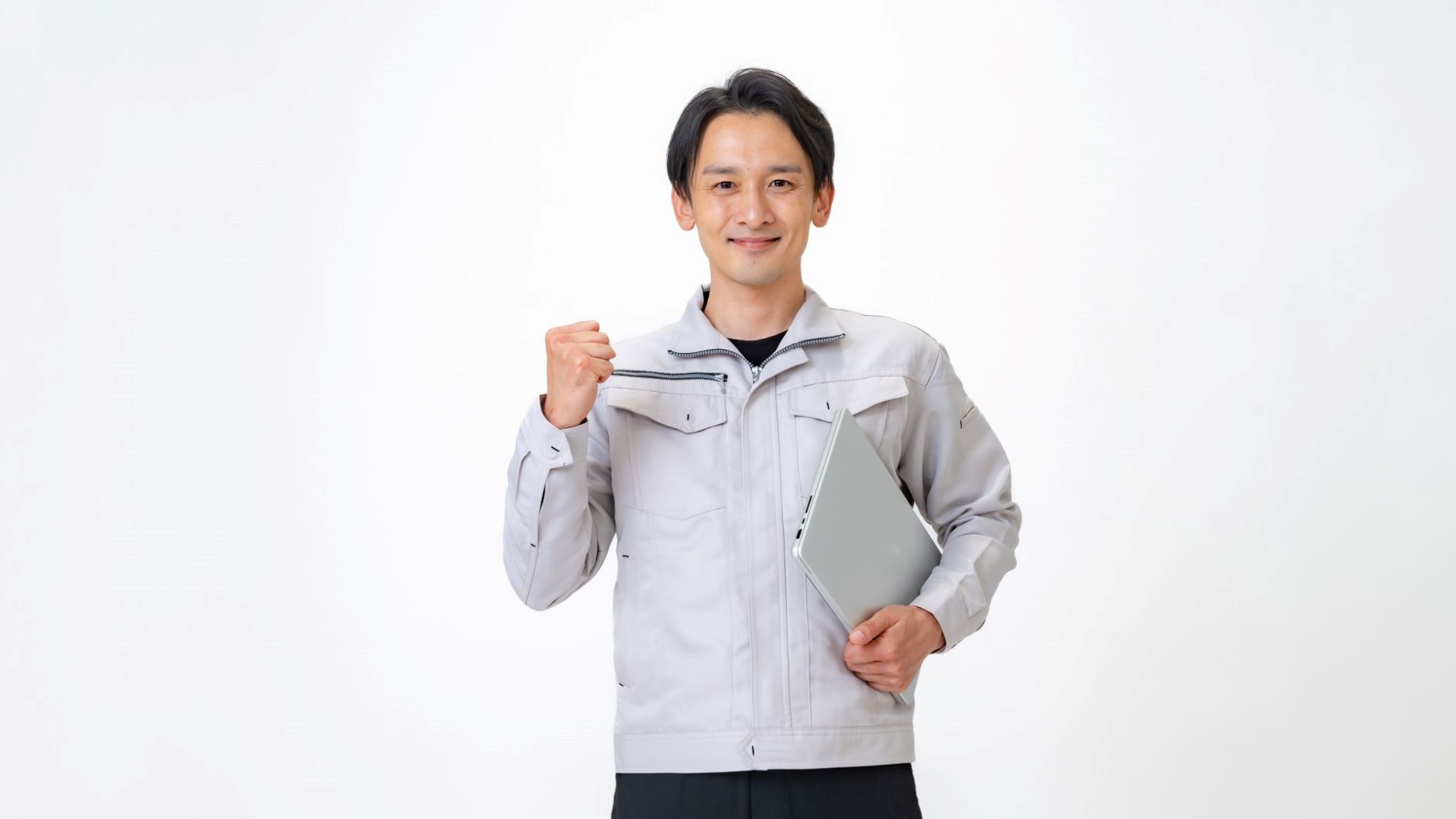作業着、ガッツポーズ男性